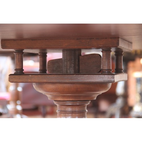 616 - A Regency style mahogany library drum table, late 20th century, the gilt tooled inset skiver above s... 