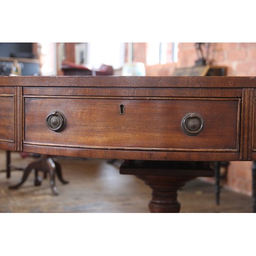 616 - A Regency style mahogany library drum table, late 20th century, the gilt tooled inset skiver above s... 