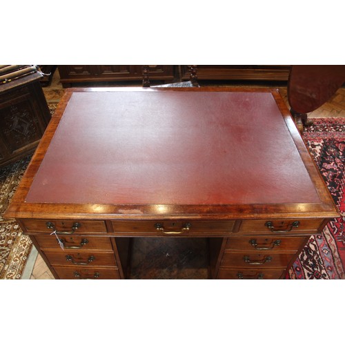 647 - A Victorian mahogany twin-pedestal desk, the rectangular moulded top with a later inset skiver over ... 