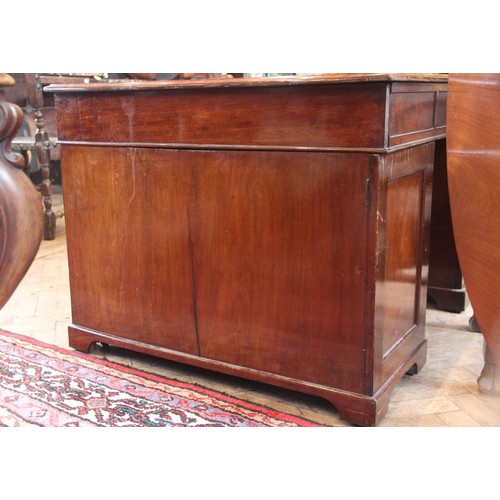 647 - A Victorian mahogany twin-pedestal desk, the rectangular moulded top with a later inset skiver over ... 