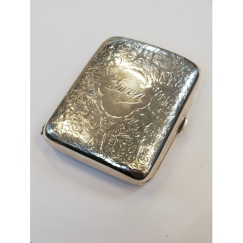 49 - An Art Deco silver cigarette case, Sharman Dermott Neill, Chester 1928, of rectangular faceted form ... 