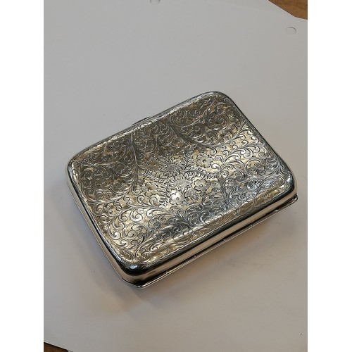 49 - An Art Deco silver cigarette case, Sharman Dermott Neill, Chester 1928, of rectangular faceted form ... 