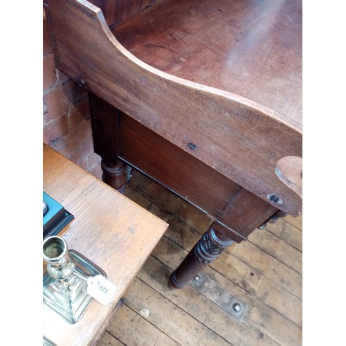 615 - A George III mahogany sideboard, the break arch raised back with a rope twist 'moustache' top rail, ... 