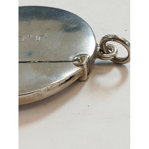 51 - An Edwardian silver box and cover, William Comyns, Birmingham 1909, of circular form with pierced fo... 