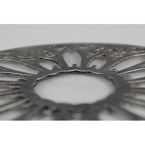 95 - A George V silver mounted glass coaster, Daniel & Arter, Birmingham 1923, the circular colourless gl... 