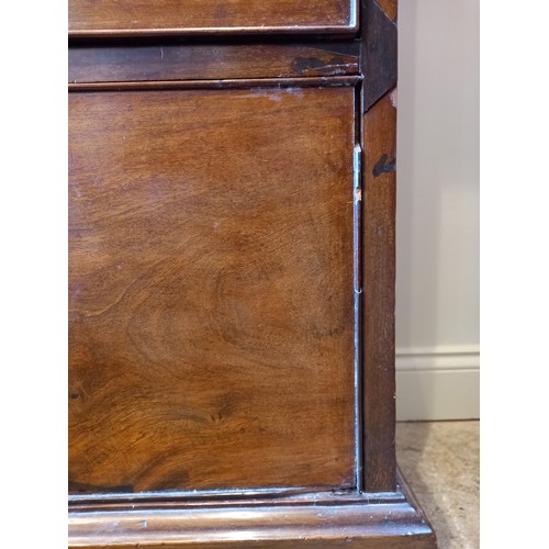 613 - A George III mahogany chest on chest, with a moulded dentil cornice over three short and three long ... 