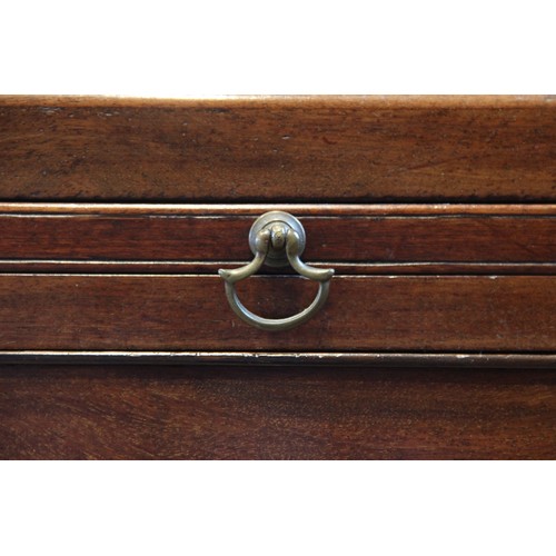 613 - A George III mahogany chest on chest, with a moulded dentil cornice over three short and three long ... 