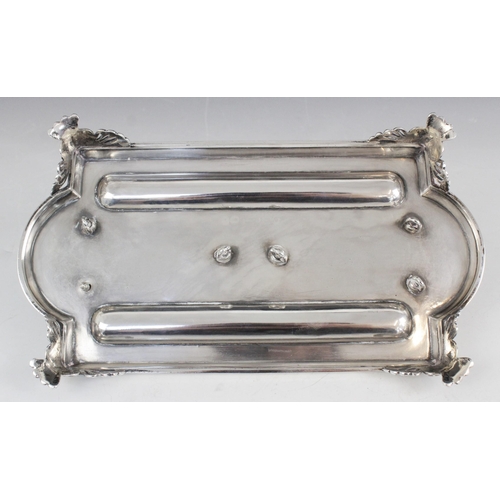 1 - A Victorian silver and cut glass desk stand, Horace Woodward & Co, Birmingham 1879, the shaped recta... 