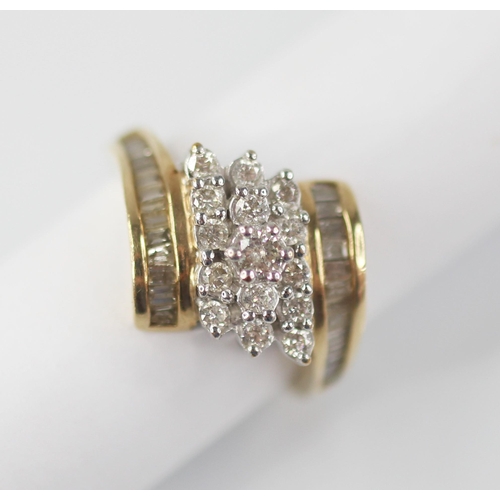 100 - A diamond set 9ct gold cluster ring, the principle round brilliant cut diamond weighing approximatel... 