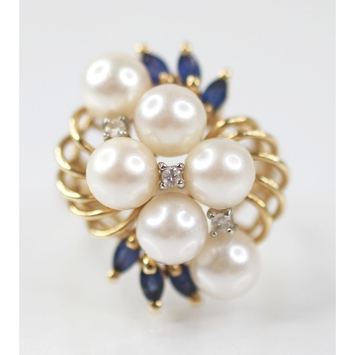 107 - A pearl, sapphire and diamond 14ct gold cocktail ring, designed as six round cultured pearls, inters... 