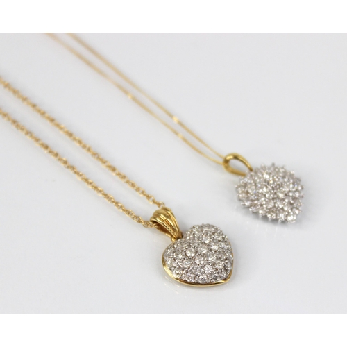 112 - A diamond set 18ct gold heart-shaped pendant, designed as a tiered cluster of round brilliant cut di... 