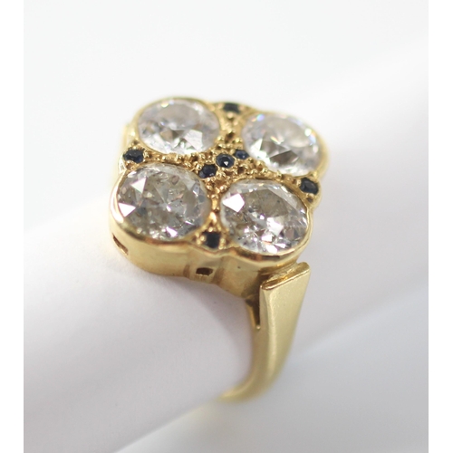 114 - A diamond four-stone ring, comprising four round old cut diamonds, measuring approximately: 6.58mm x... 