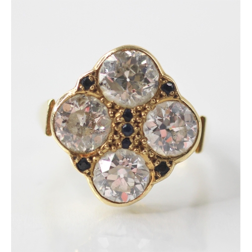 114 - A diamond four-stone ring, comprising four round old cut diamonds, measuring approximately: 6.58mm x... 