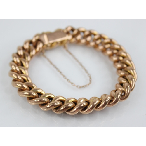 122 - A Victorian gold coloured curb link bracelet, tongue and box snap clasp fastening, tongue stamped '9... 