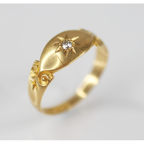 126 - An Edwardian diamond set 18ct gold ring, the central single cut diamond gypsy star set to a navette ... 