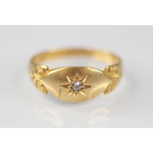 126 - An Edwardian diamond set 18ct gold ring, the central single cut diamond gypsy star set to a navette ... 