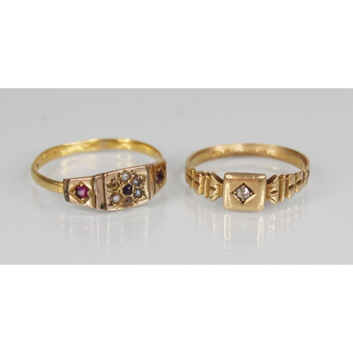 127 - A Victorian diamond set 15ct gold ring, the central old cut diamond set to a square head, continuing... 