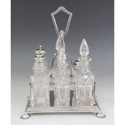 13 - A Victorian silver plated cruet by Latham & Morton, the rectangular base with six divisions and face... 