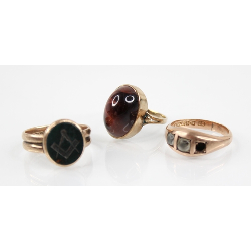 131 - A Victorian 9ct gold bloodstone set Masonic ring, the oval bloodstone head engraved with compass and... 