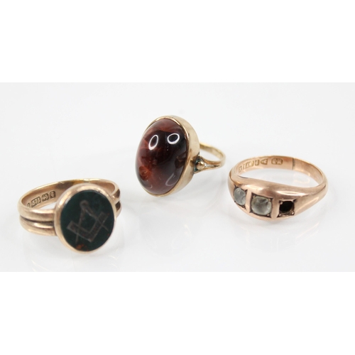 131 - A Victorian 9ct gold bloodstone set Masonic ring, the oval bloodstone head engraved with compass and... 