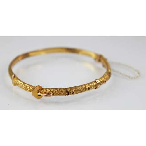 132 - An early 20th century 9ct gold bangle, possibly Smith & Pepper Ltd, Birmingham (date letter worn), o... 