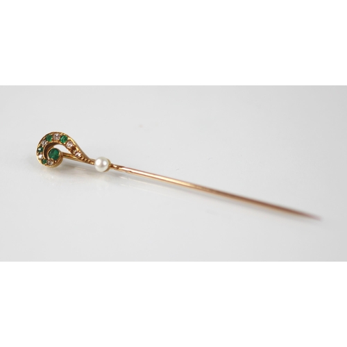 135 - A novelty diamond, emerald and pearl stick pin, modelled as a question mark, set with mixed cut diam... 