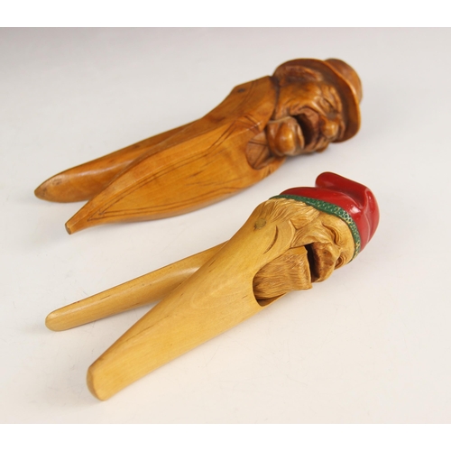 159 - A continental novelty treen nutcracker, mid-20th century, modelled as an elderly gentleman wearing a... 