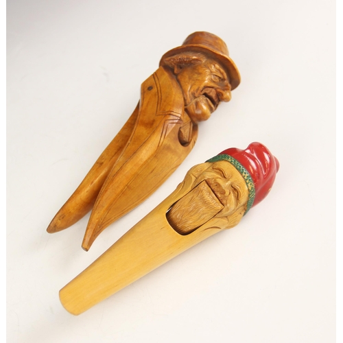 159 - A continental novelty treen nutcracker, mid-20th century, modelled as an elderly gentleman wearing a... 