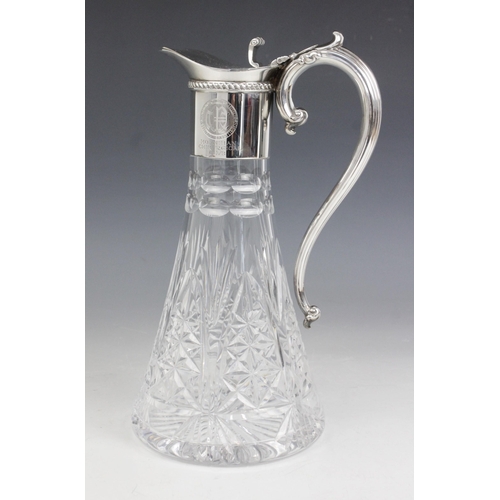 17 - A silver mounted cut glass claret jug, Barker Ellis Silver Co, Birmingham 1994, the tapering body wi... 