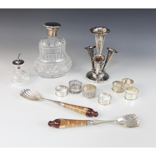 23 - A selection of silver and silver mounted tableware, to include a George V silver mounted cut glass d... 
