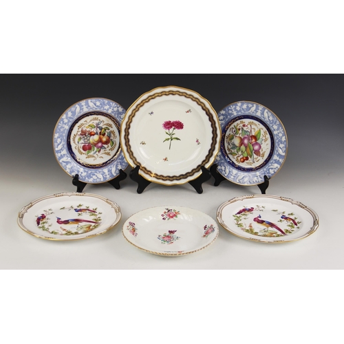 374 - A pair of Newhall pate-sur-pate plates, early 19th century, centrally painted with fruits, within a ... 