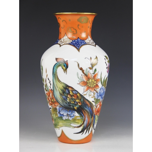 399 - A Heinrich & Co German porcelain vase, 20th century, of ovoid form with flared neck, hand decorated ... 