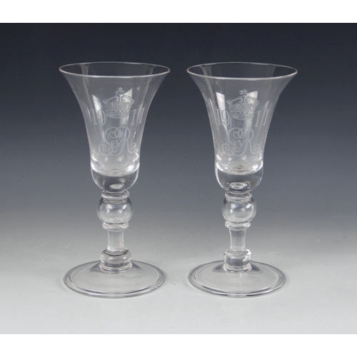 406 - A pair of George V coronation commemorative goblets, early 20th century, each of trumpet form, the b... 