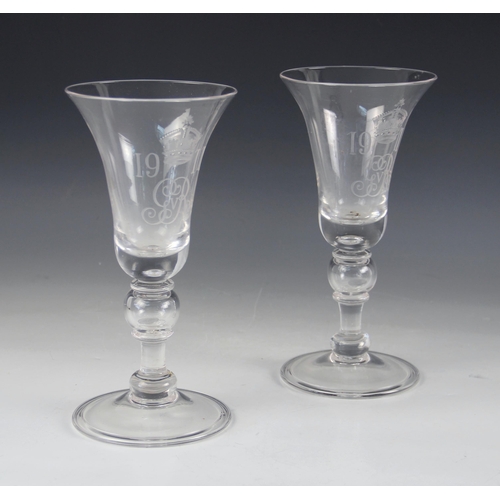 406 - A pair of George V coronation commemorative goblets, early 20th century, each of trumpet form, the b... 