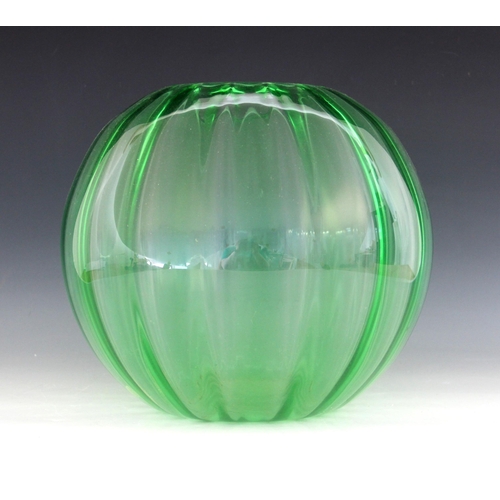 411 - An Art Deco uranium green glass vase, early 20th century, of internally lobed spherical form with pl... 