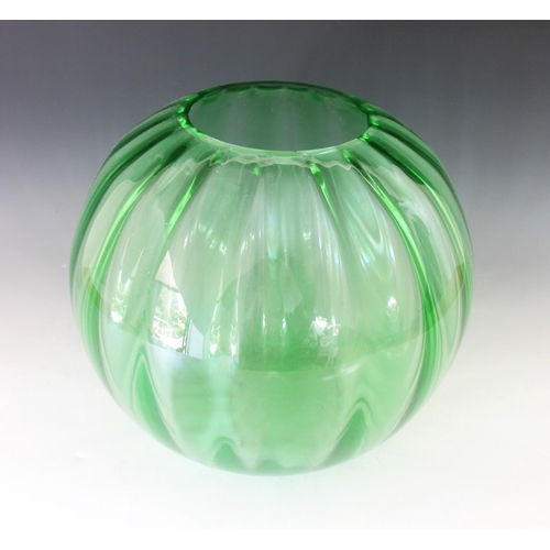 411 - An Art Deco uranium green glass vase, early 20th century, of internally lobed spherical form with pl... 