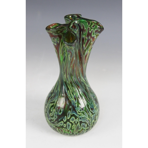 413 - A Murano style glass posy vase, early 20th century, of baluster form with frilled rim, in green, yel... 