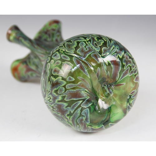 413 - A Murano style glass posy vase, early 20th century, of baluster form with frilled rim, in green, yel... 