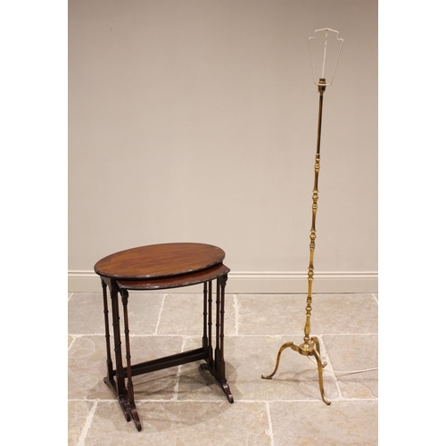 426 - A brass standard lamp, mid 20th century, of knopped form extending to three down swept supports, 136... 