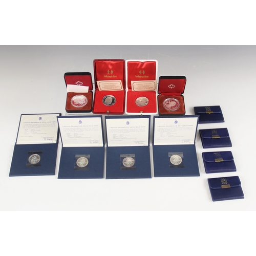 46 - A selection of silver commemorative coins, to include four silver 500 lire coins commemorating the V... 