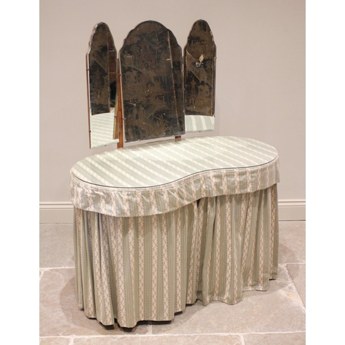 735 - A mid 20th century kidney shaped dressing table, the triptych mirror above a pair of three drawer pe... 