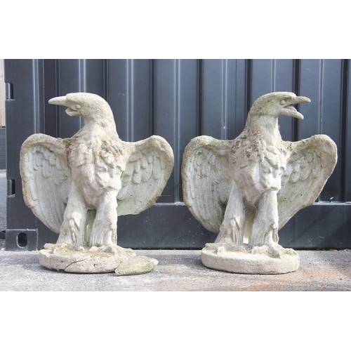 754 - A pair of reconstituted stone eagle pier finials, late 19th century, in the manner of Austin & Seele... 