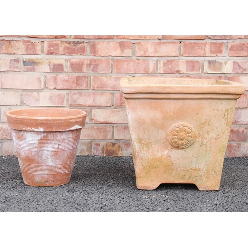 758 - A terracotta planter, of cubic form, moulded in relief with roundel detail, 43cm H x 48cm Sq, along ... 