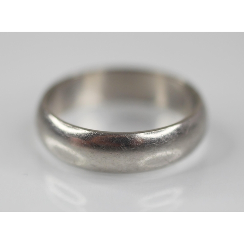 76 - A platinum wedding band, marks for 'BMS', Birmingham 2000, ring size T 1/2, weight 10.4gms