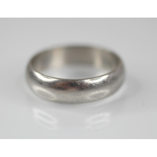 76 - A platinum wedding band, marks for 'BMS', Birmingham 2000, ring size T 1/2, weight 10.4gms