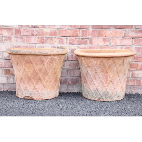 760 - A pair of terracotta wall planters, of flared demi lune form with moulded lattice detail, 42cm H x 6... 