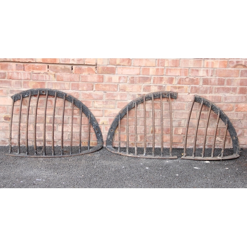 764 - Three Victorian cast iron corner hanging hay racks, from 67cm high to 92cm high (3)