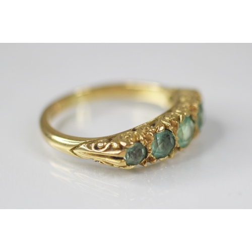 82 - A Victorian style five stone ring, comprising five graduated round mixed cut blue-green gemstones (p... 