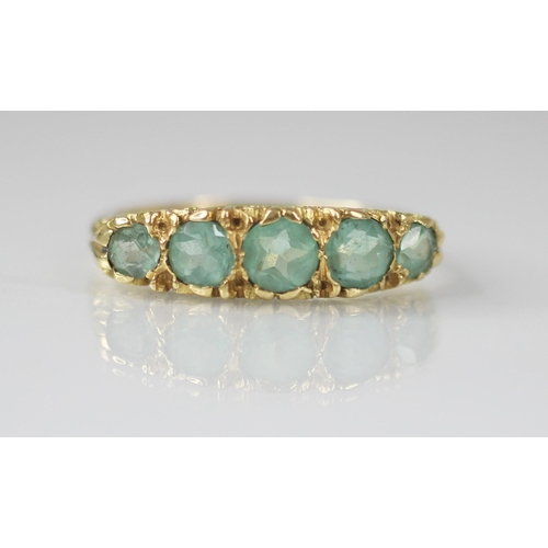 82 - A Victorian style five stone ring, comprising five graduated round mixed cut blue-green gemstones (p... 