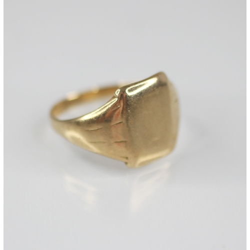 84 - A gentleman's gold coloured signet ring, the plain polished rectangular cartouche measuring 14mm x 1... 